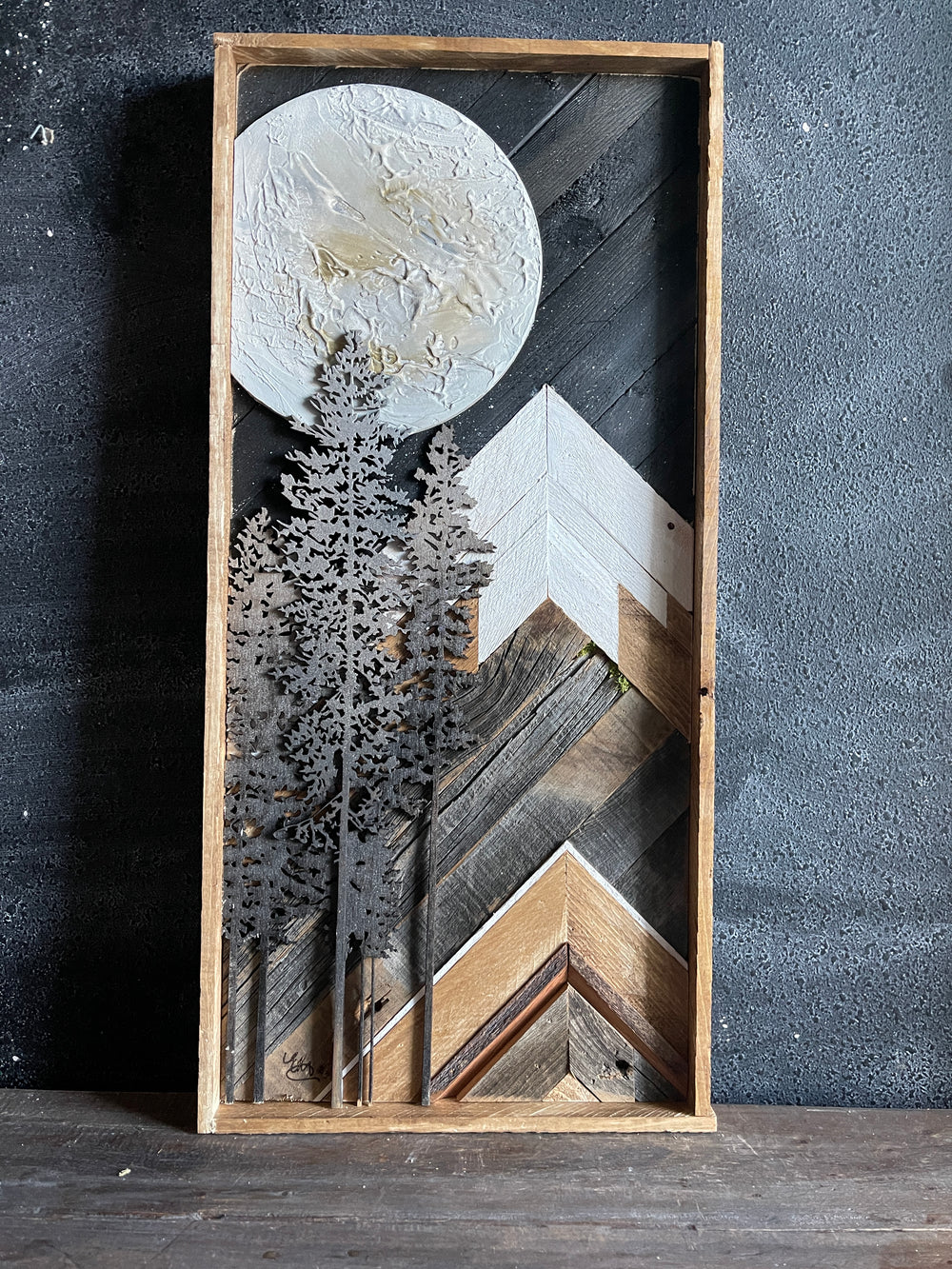 Metallic Trees against a Full Moon